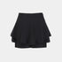 A black high-waisted athletic mini skirt with a layered ruffle design, shown flat against a light gray background.