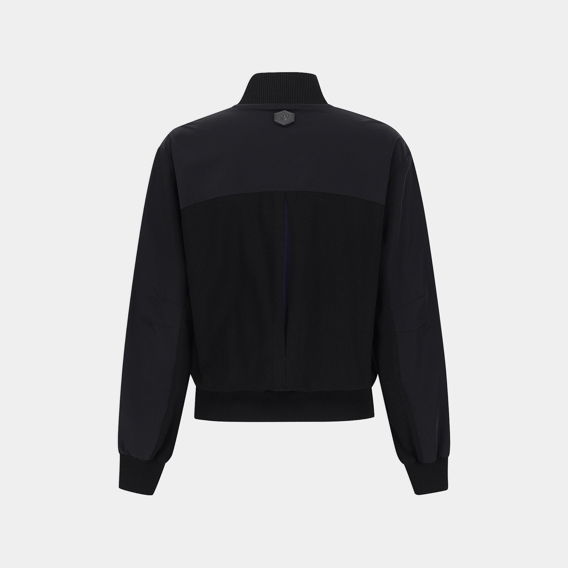 A black color-blocked bomber jacket with a mock neck, ribbed hem and cuffs, shown from the back on a light gray background.