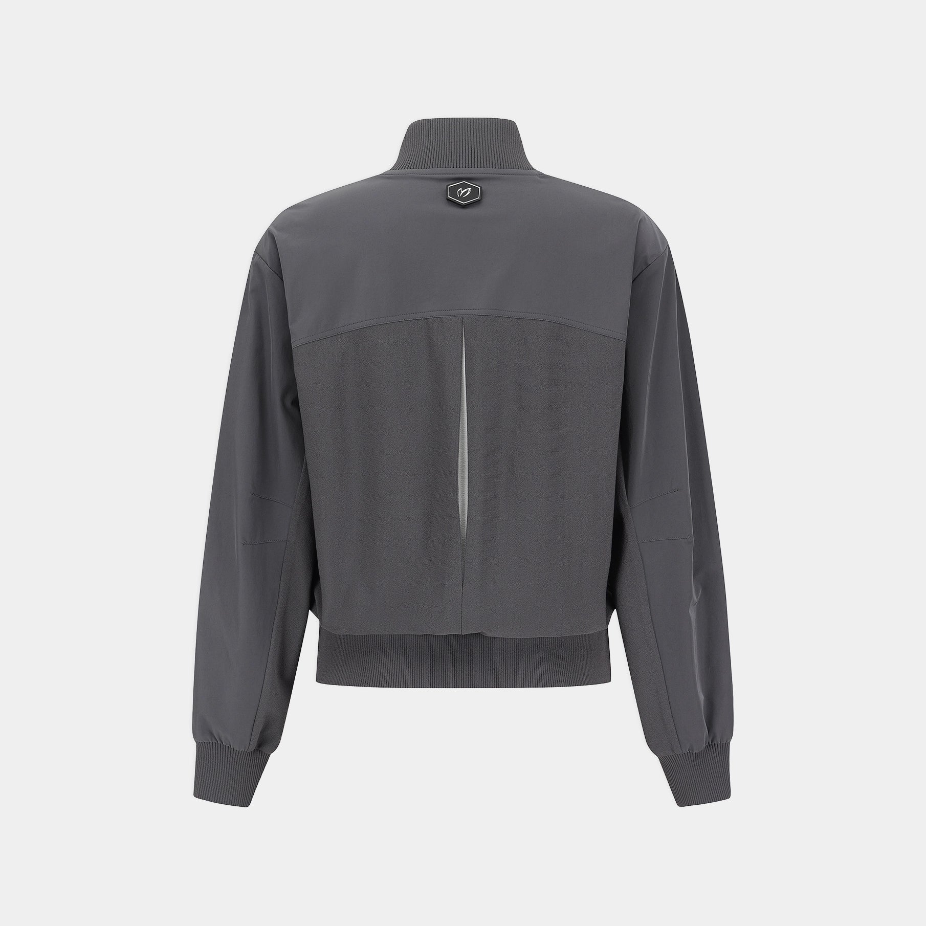 A dark gray athletic jacket shown from the back, featuring a high mock neck, a vertical zip closure, and ribbed cuffs and hem, displayed on a light gray background.