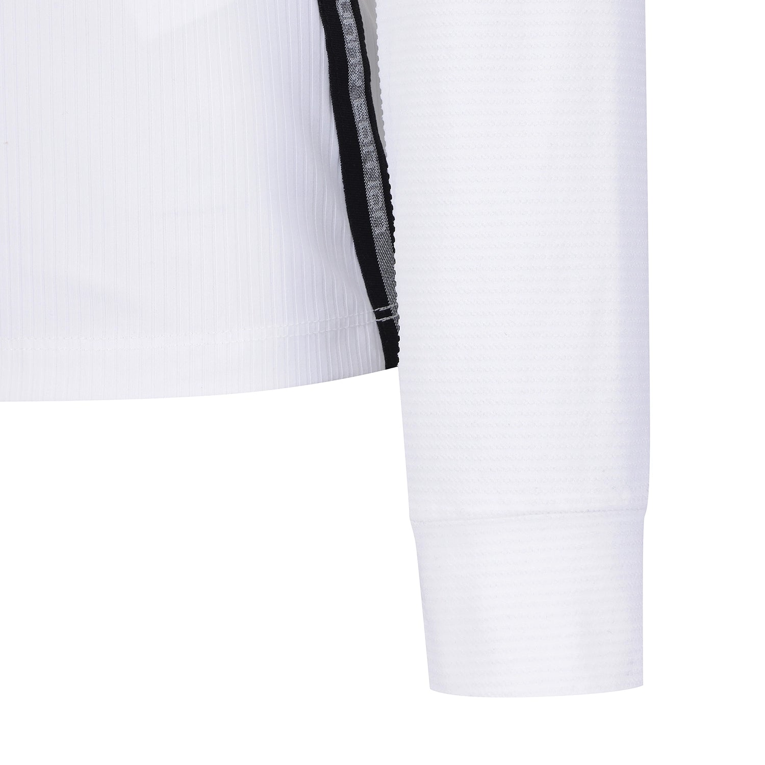 Close-up of a white long-sleeve shirt showing the sleeve cuff and side seam detail with a black and gray striped accent stripe.