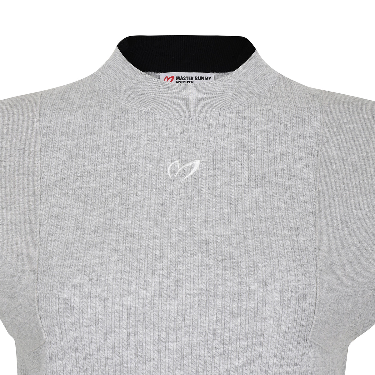 Close-up of a light gray ribbed knit top with a black inner collar and a small white embroidered logo on the chest. The neck label reads Master Bunny.
