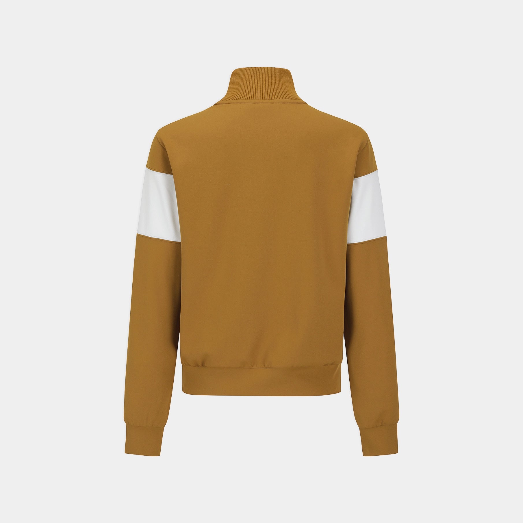 A colorblock track jacket shown from the back, featuring a mustard yellow body and sleeves with contrasting white shoulder panels, set against a light gray background.
