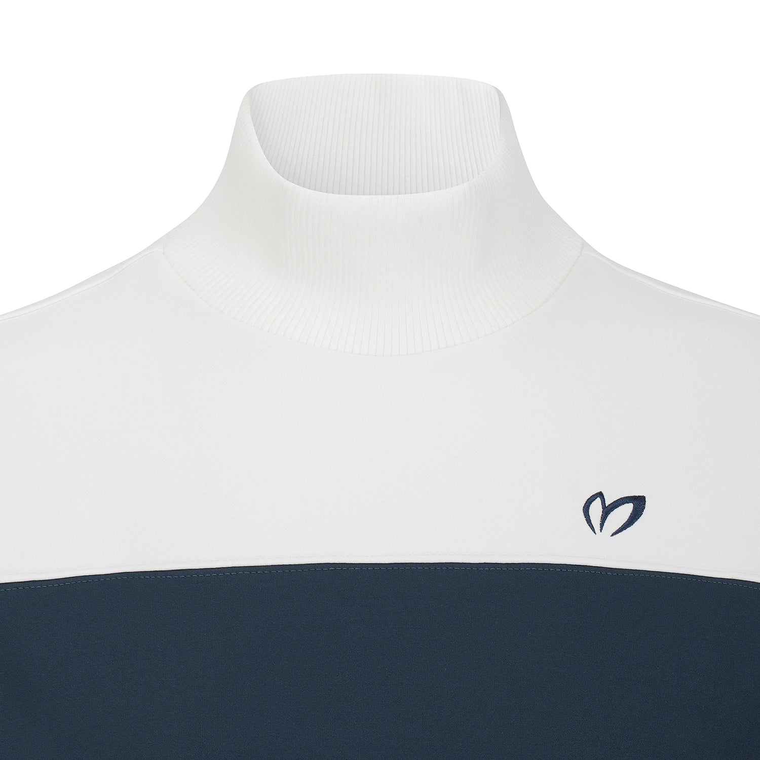 Close-up of a colorblock turtleneck sweater with a white upper section, a dark navy lower section, and a small dark navy logo on the left chest.