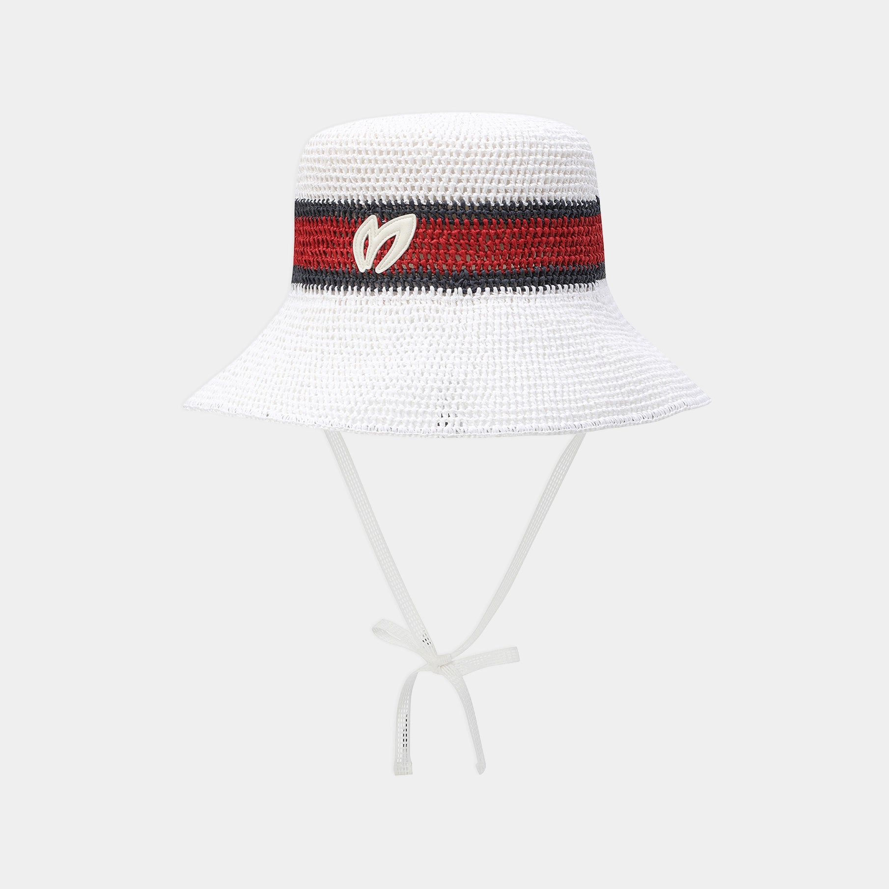 A straw bucket hat on a clean white background. 