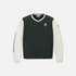 A long-sleeve pullover sweatshirt with a dark forest green body and off-white sleeves, featuring a white V-neck collar, a small diamond-shaped chest logo, and &