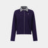 A dark purple knit button-up cardigan with a contrasting gray textured collar, shown on a light gray background.