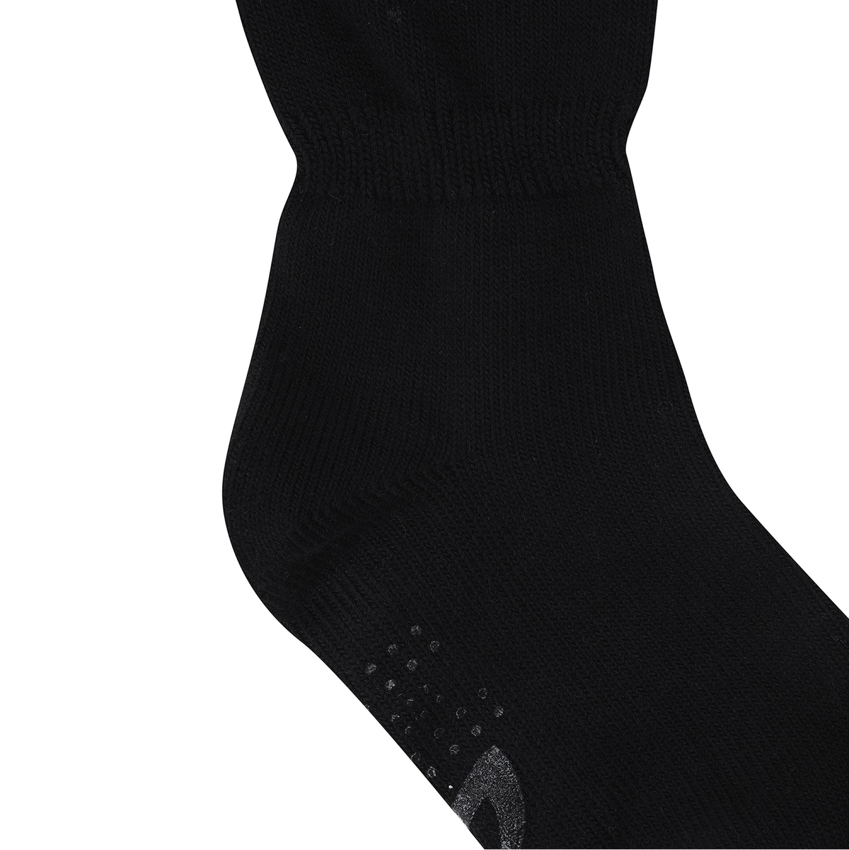 A close-up of a black athletic sock showing the ribbed ankle cuff and textured grip dots on the sole, set against a plain white background.
