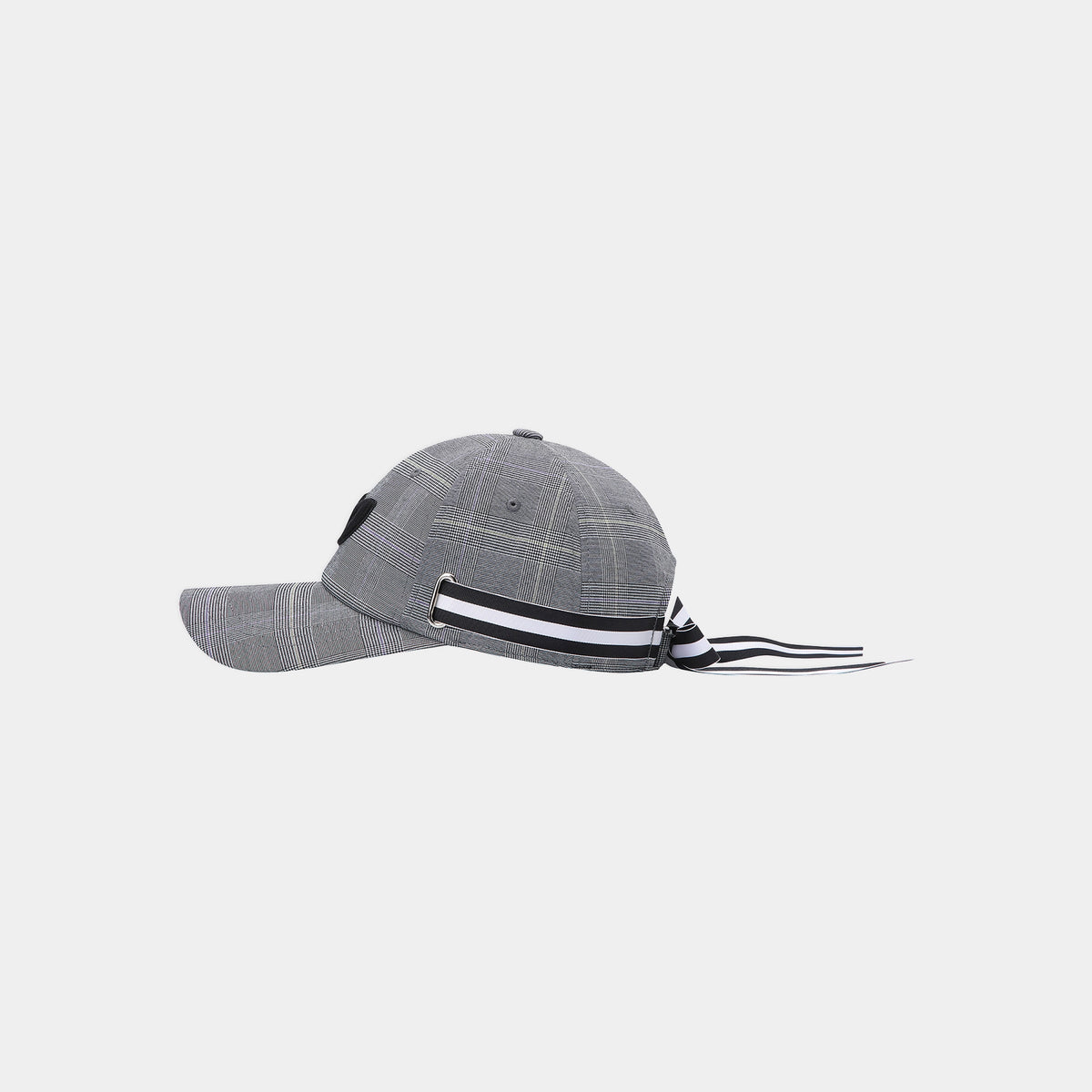 A gray plaid baseball cap with a black and white striped ribbon tied to the back of the crown, shown against a light gray background.