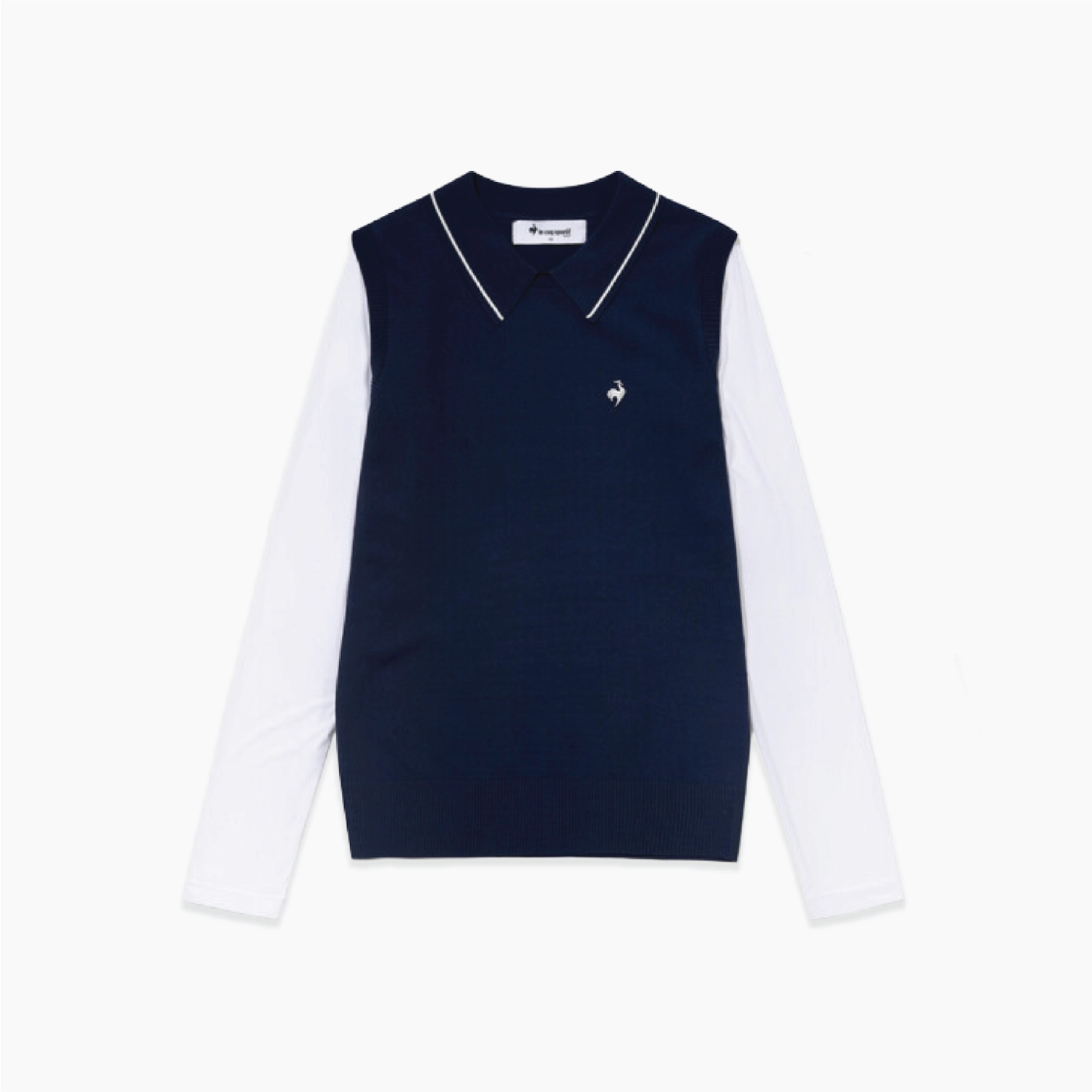A navy blue knit sweater vest layered over a white long-sleeve collared shirt, featuring a small white embroidered rooster logo on the left chest. 