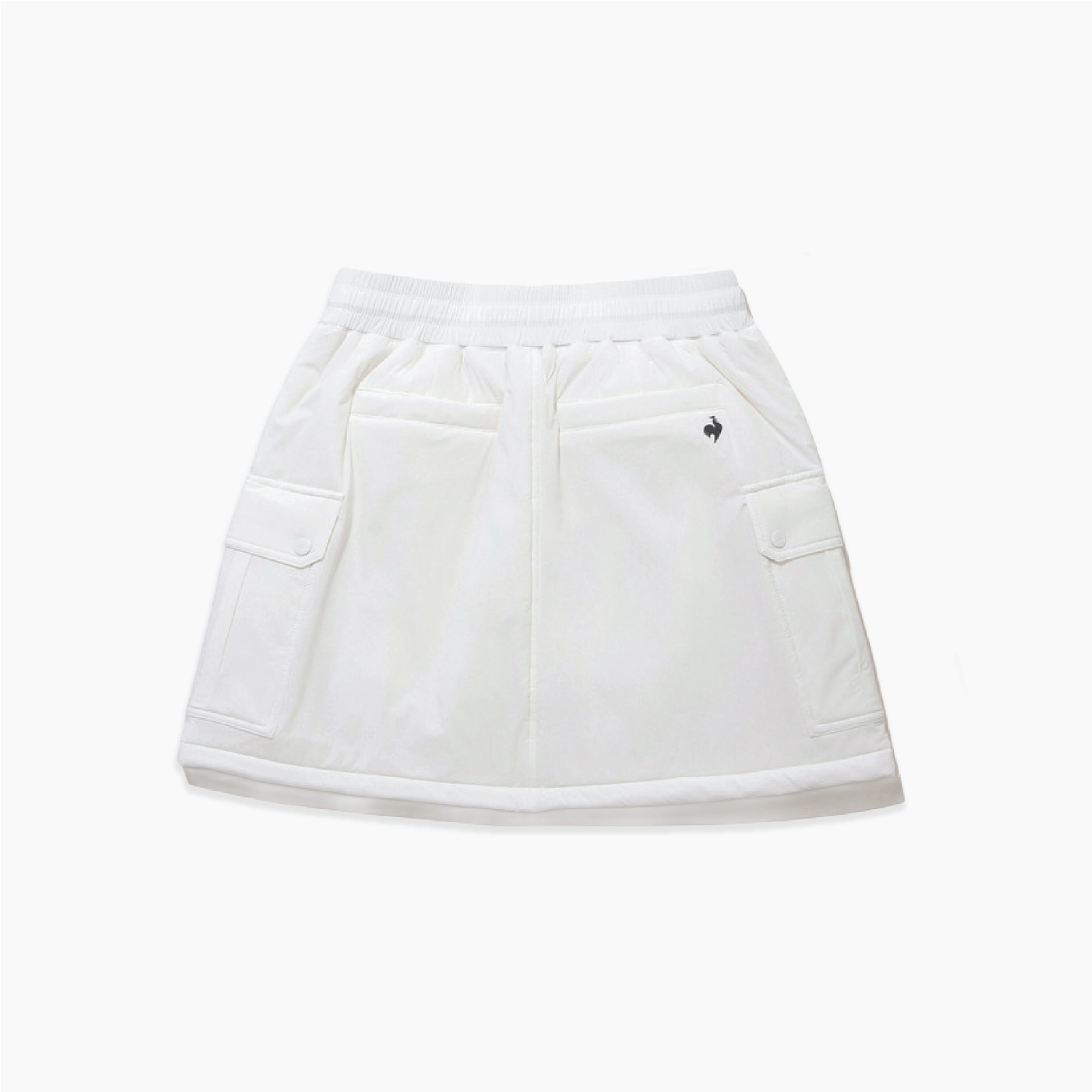 White cargo-style mini skirt with an elastic waistband, two large flap cargo pockets, and a small dark embroidered logo on the upper right side, shown on a plain white background.
