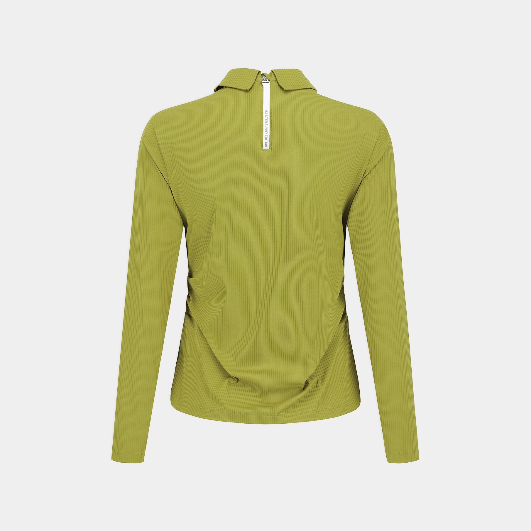 A long-sleeve ribbed knit top shown from the back, featuring a half-zip collar and a vertical white zipper pull with black text, displayed on a light gray background.