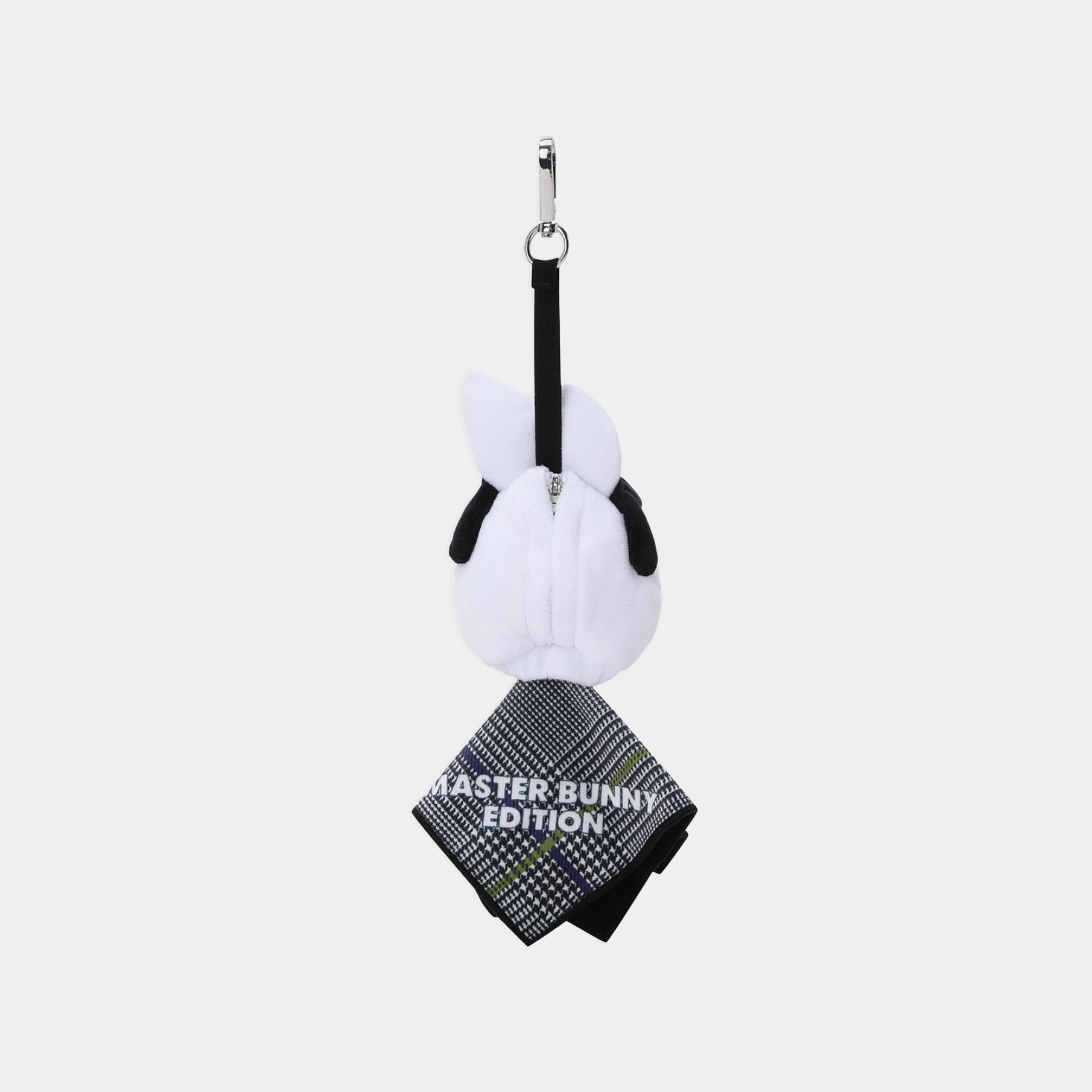 A plush keychain or bag charm shaped like a white bunny wearing a black and white patterned necktie with the text 'MASTER BUNNY EDITION' printed on it, attached to a black strap and silver metal clasp, shown against a light gray background.