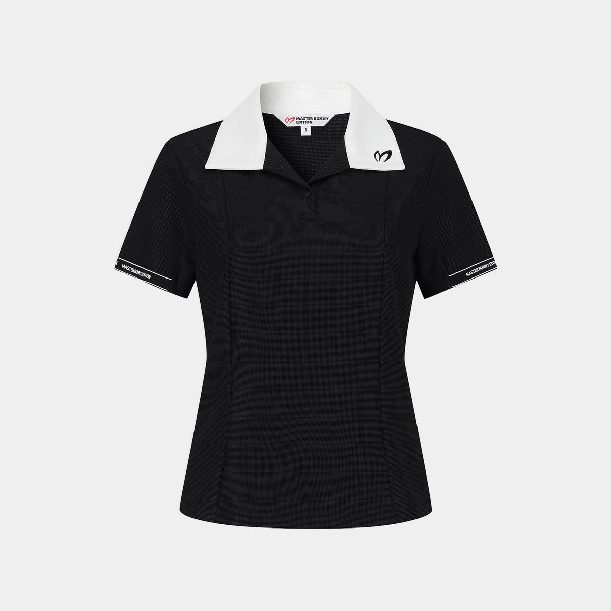 A black short-sleeve polo shirt with a contrasting white collar, featuring a small white heart logo on the left chest and white trim on the sleeve cuffs, shown against a light gray background.
