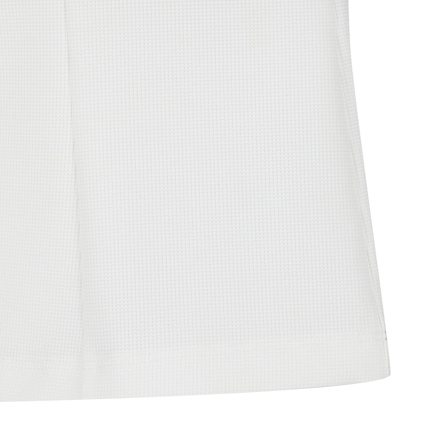 Close-up of a white textured fabric surface with a subtle woven pattern and a hemmed edge, shown against a white background.