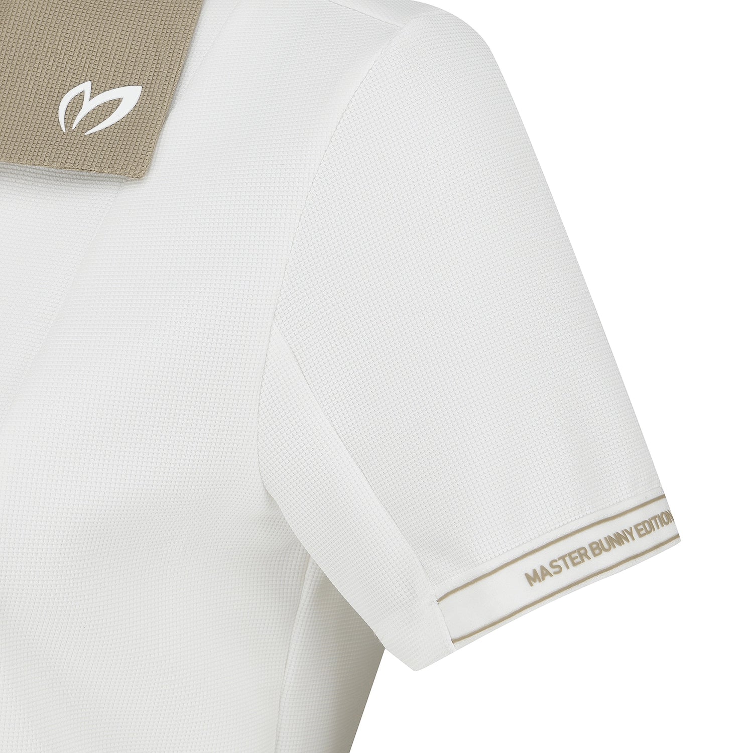 Close-up of a white short-sleeve athletic shirt showing the textured fabric, a beige collar patch with a white logo, and 'MASTER BUNNY EDITION' text on the sleeve cuff.
