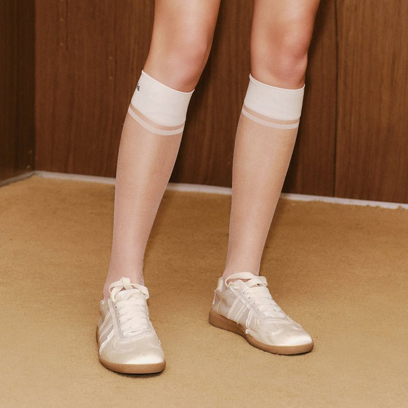 Keypote Women's White Knee High Golf Sock on Model | Erthe Golf