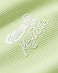 Keypote Women's premium mint green golf polo, textured fabric and logo macro