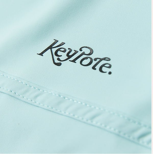 Keypote Women's Blue Sleeveless Golf Polo Embroidered Logo Closeup | Erthe Golf