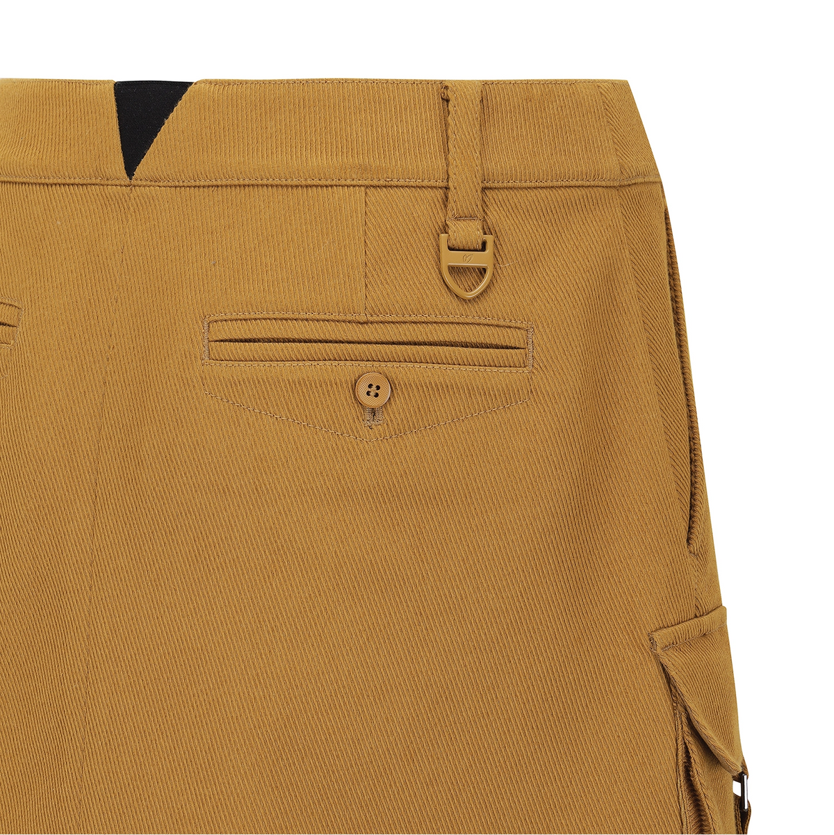 Close-up of the back waistband and pocket details of a pair of mustard yellow corduroy trousers, showing a buttoned welt pocket, belt loop, and side cargo pocket.