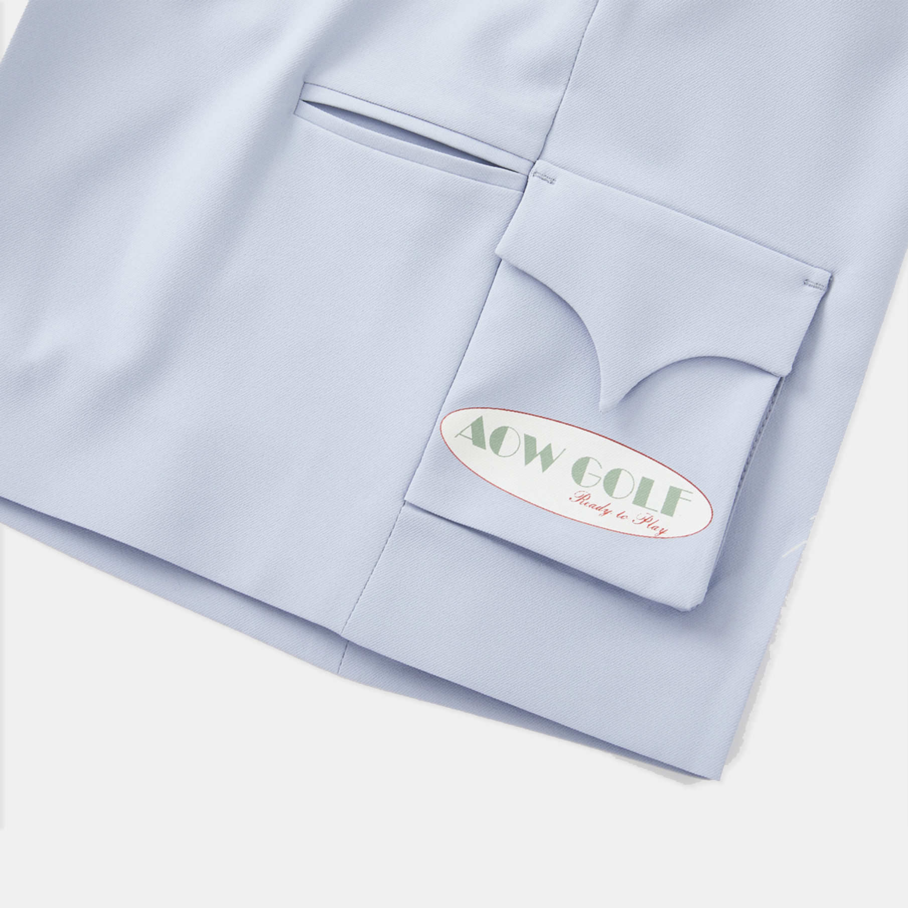 Light blue short with a brand logo on the pocket on a white background