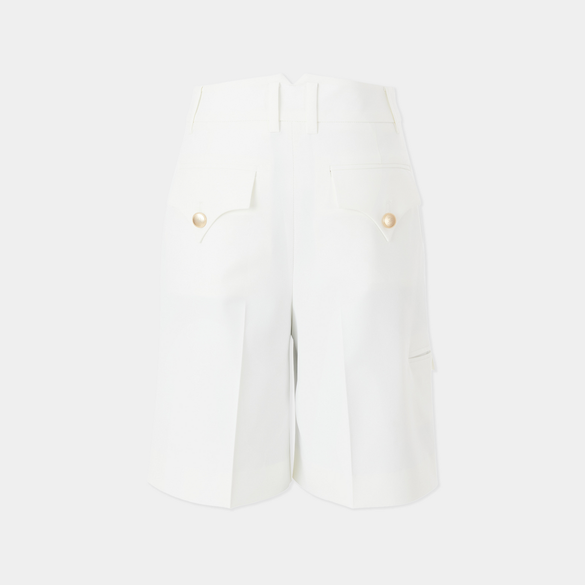 White shorts with gold buttons on a white background