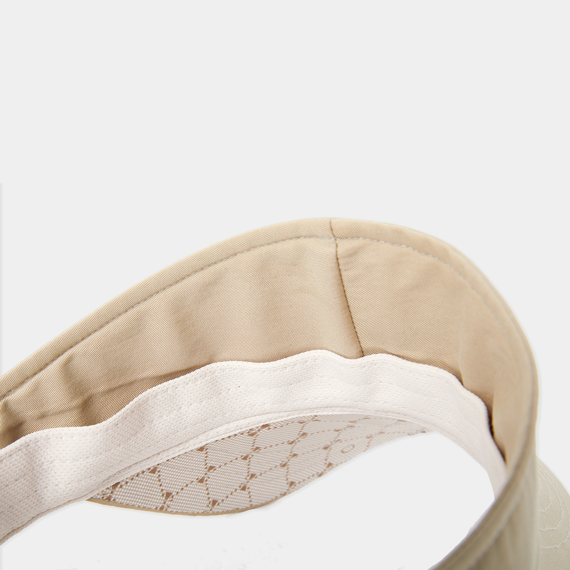 Beige and white visor on a white background