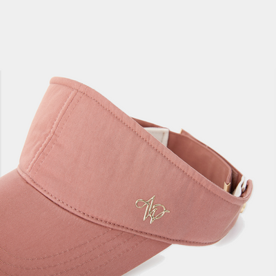 Pink visor with a logo on a white background