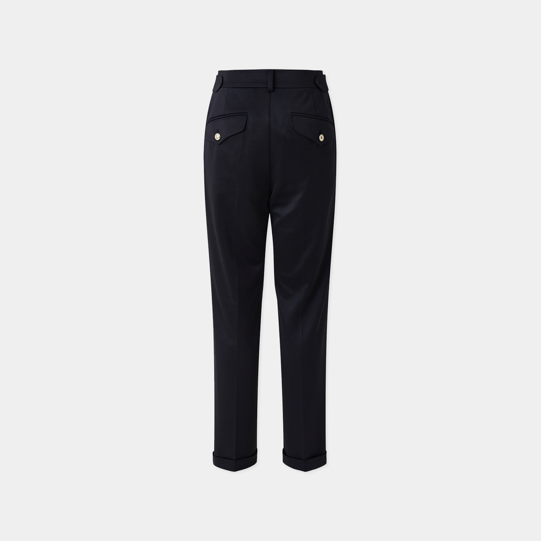 Black pants with button details on a white background