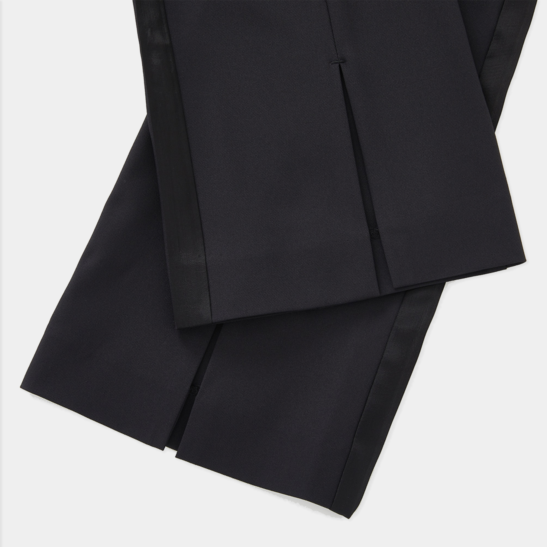 Black fabric with a textured surface on a white background
