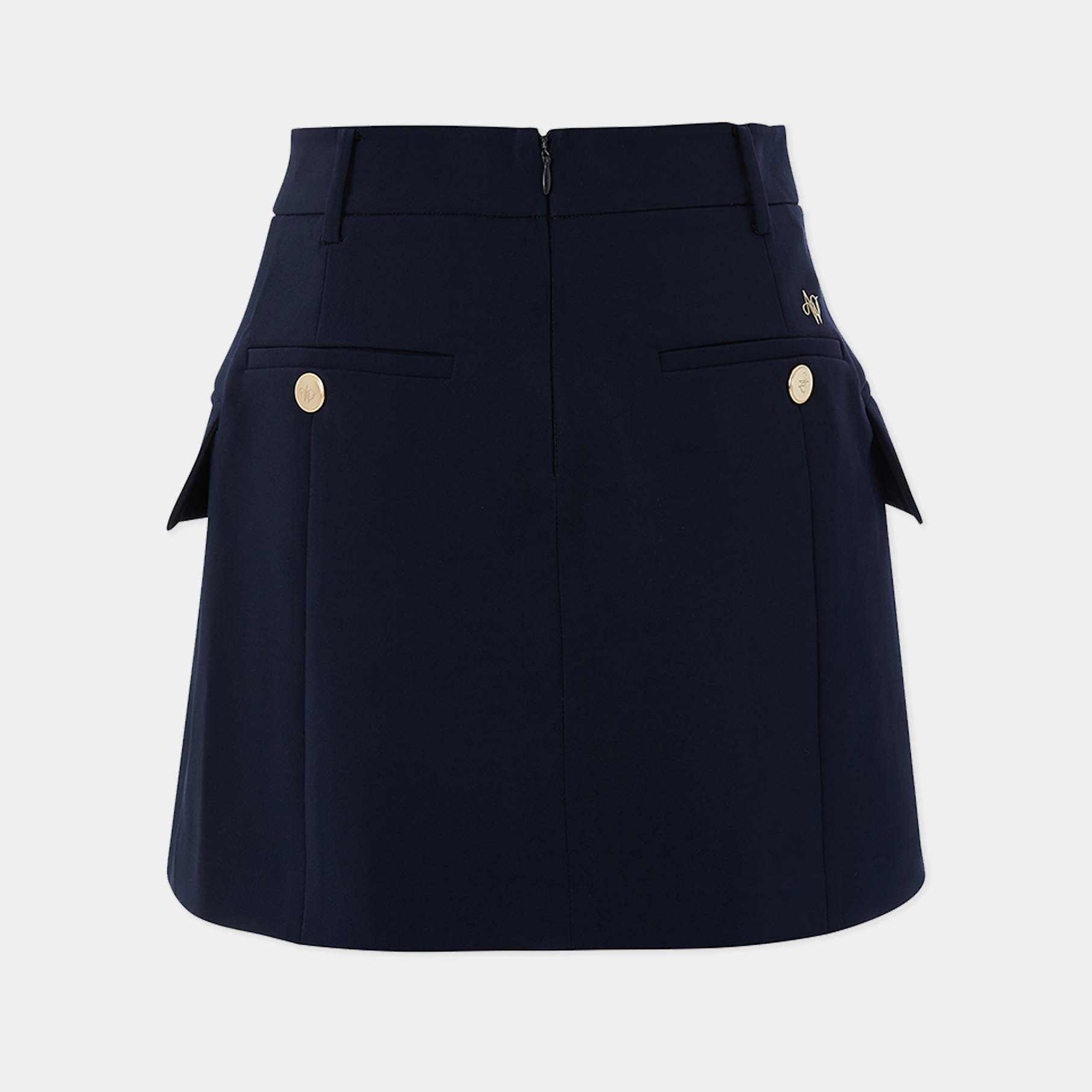 Navy blue skirt with gold buttons on a light gray background