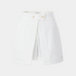 White skirt with button details on a light gray background