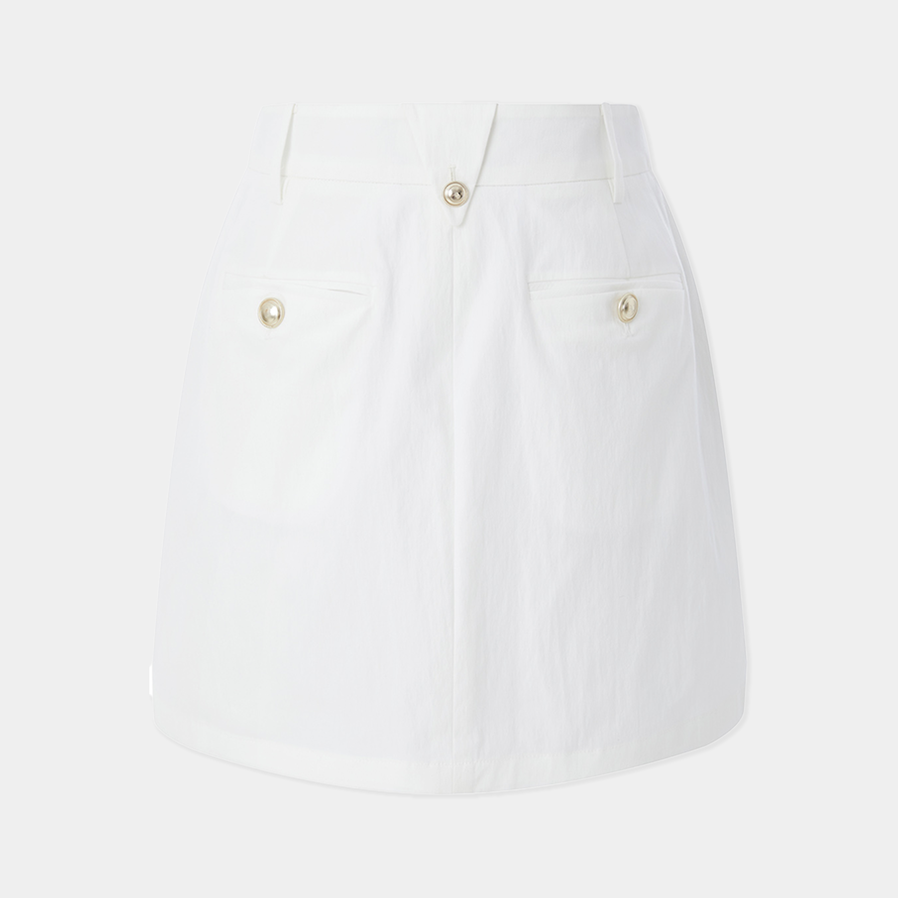 White skirt with gold buttons on a light gray background