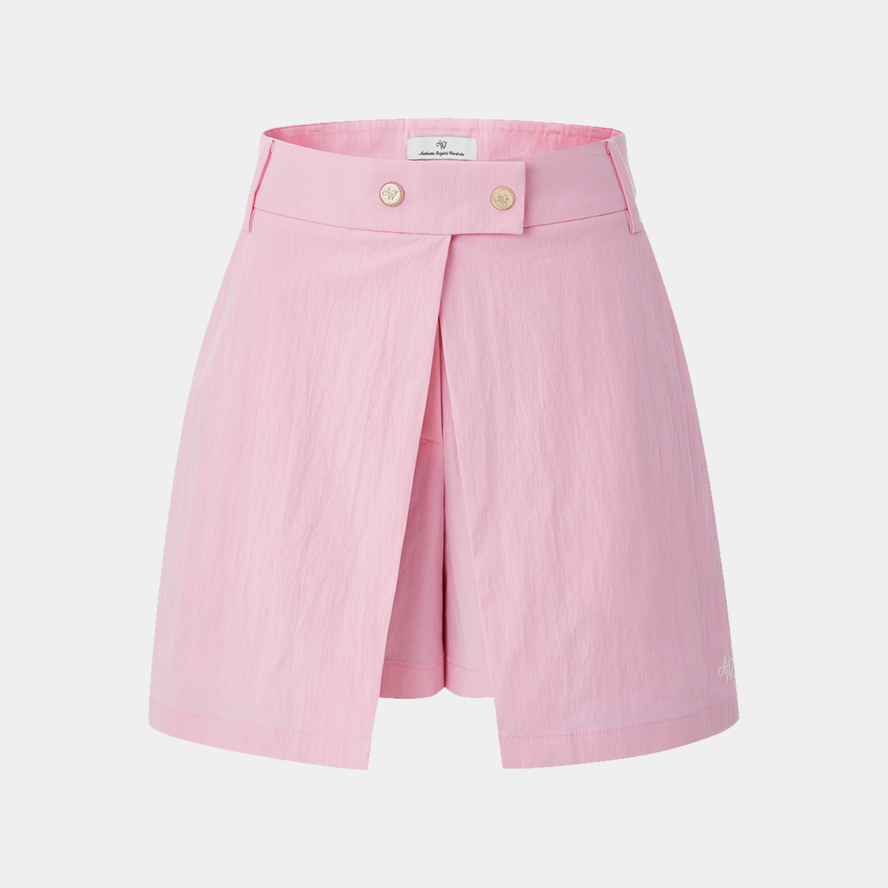 Pink shorts with button details on a light gray background
