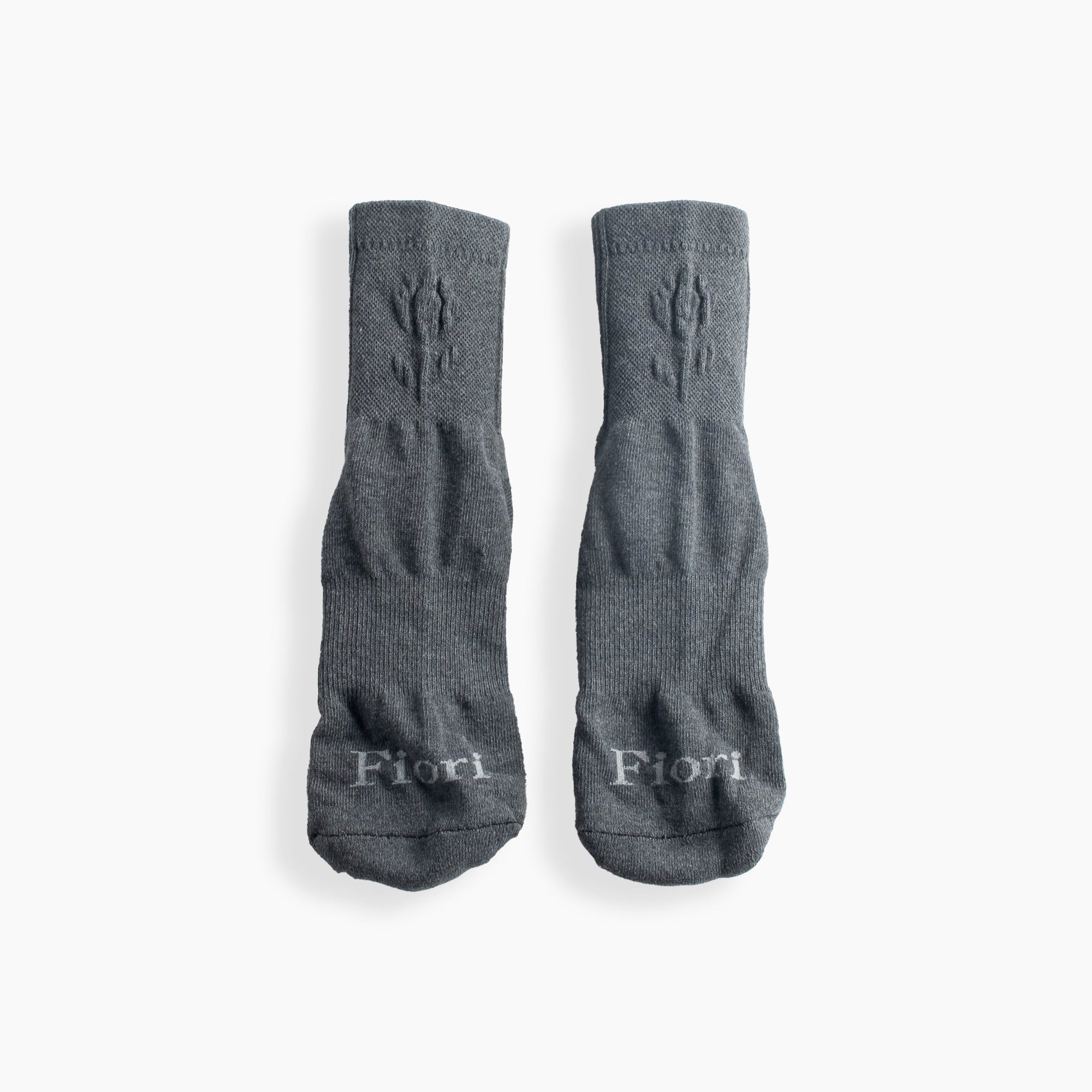 Pair of gray embossed quarter socks with logo detail at the foot, shown front view on a clean background. Embossed Quarter Socks - Gray - Erthe Golf