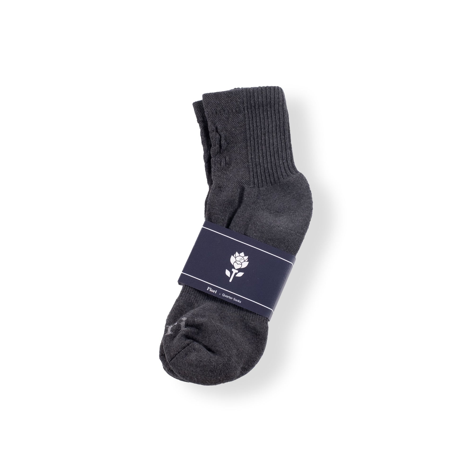 Packaged pair of gray embossed quarter socks with branded band, shown on a clean background. Embossed Quarter Socks - Gray - Erthe Golf