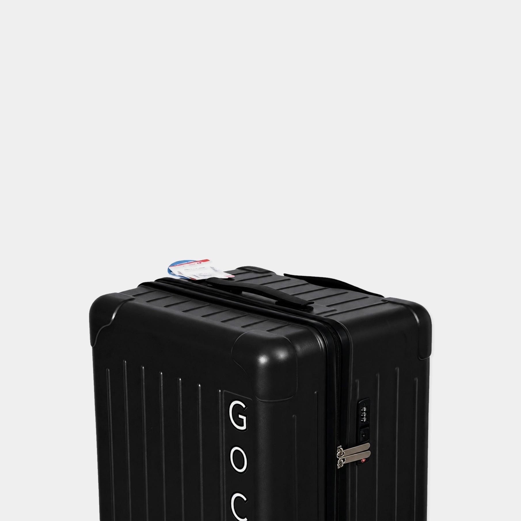 Black travel case with visible brand logo on a light gray background