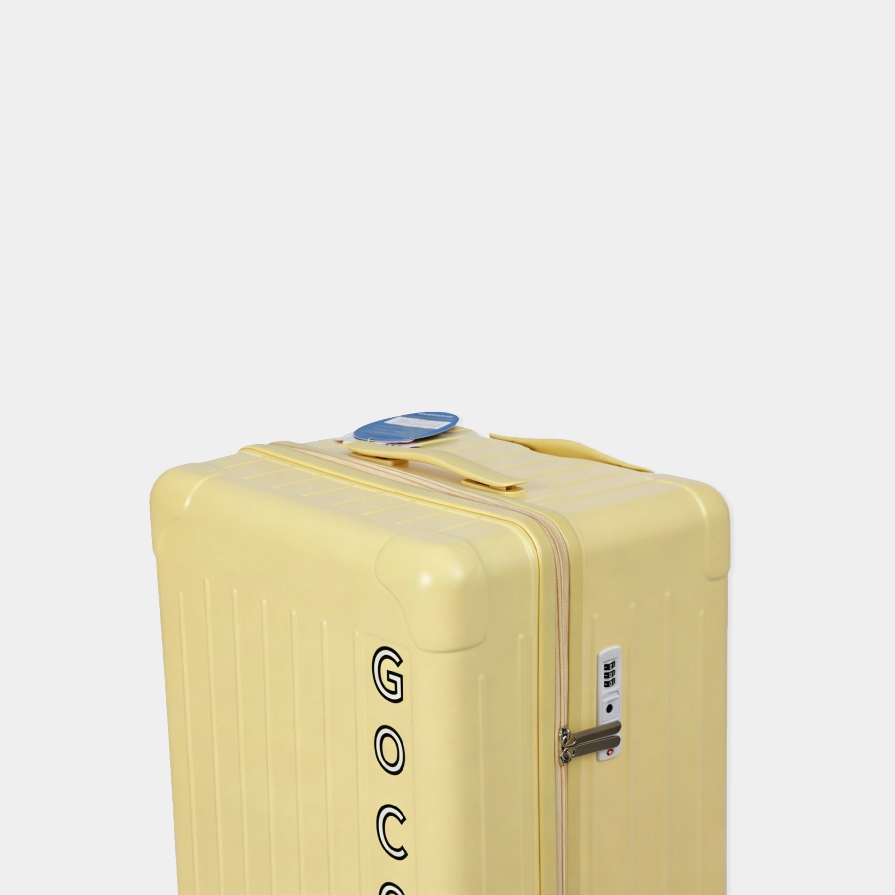 Yellow suitcase with a visible brand logo on a light gray background