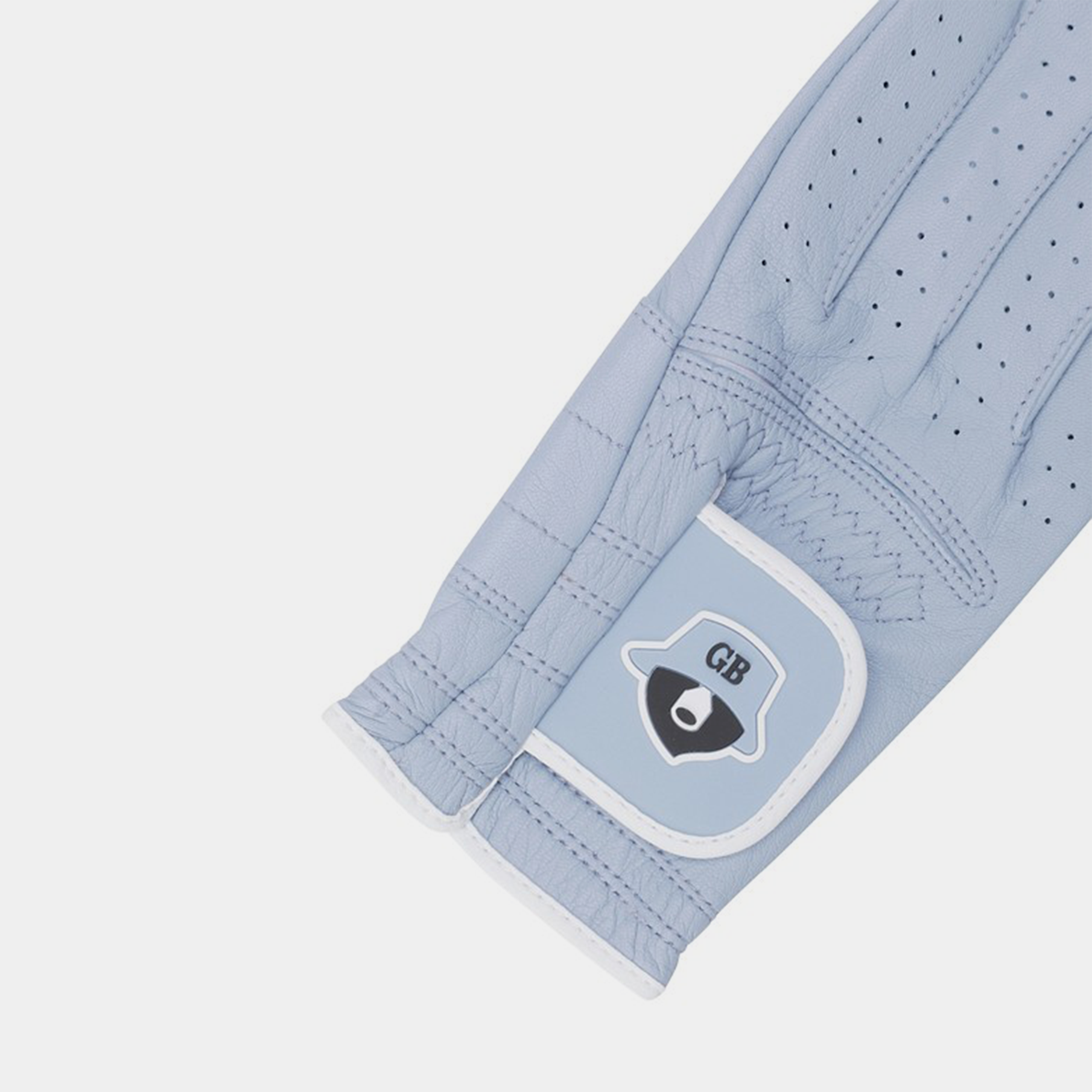 Light blue gloves with a logo patch on a white background