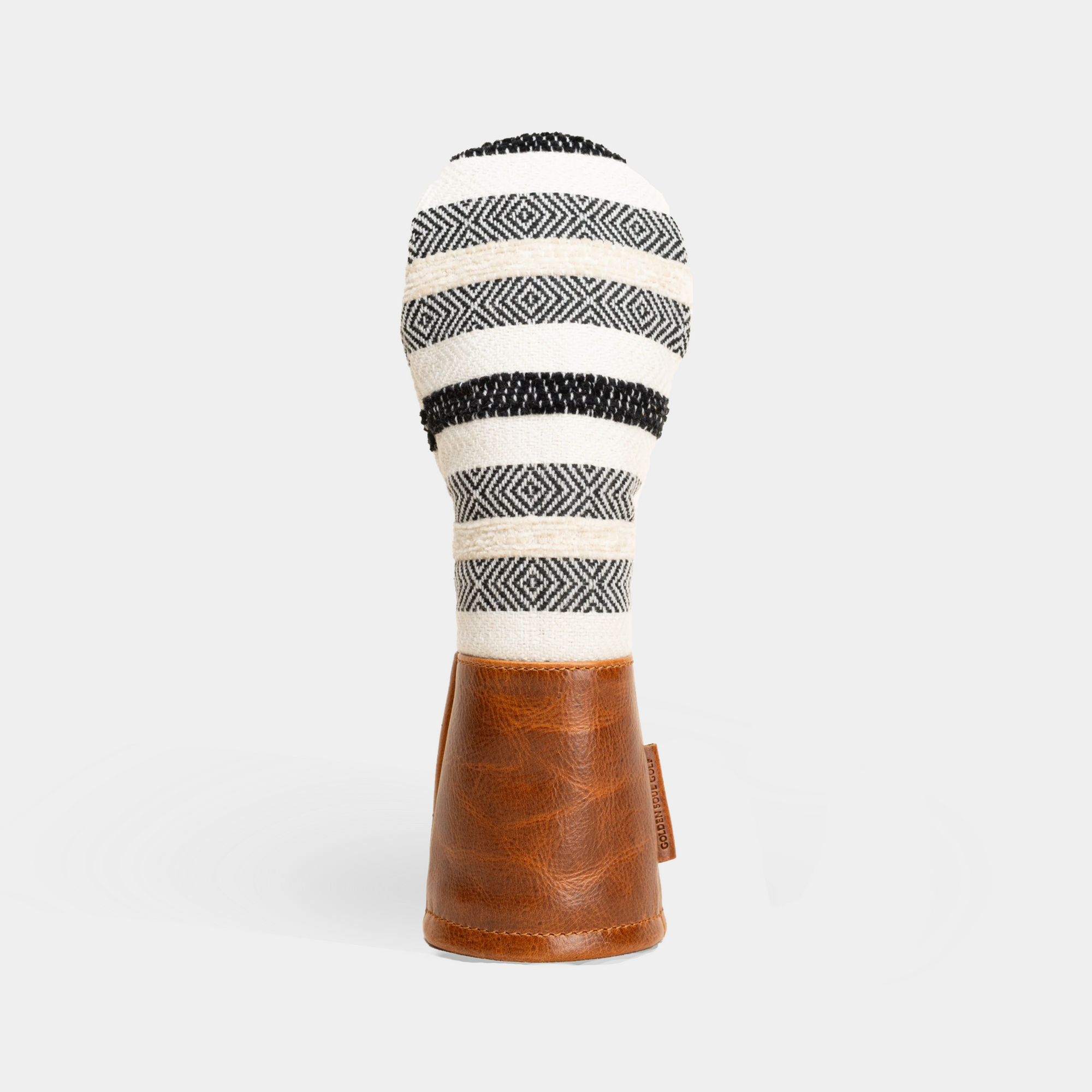 Fairway wood head cover on a light gray background - front view