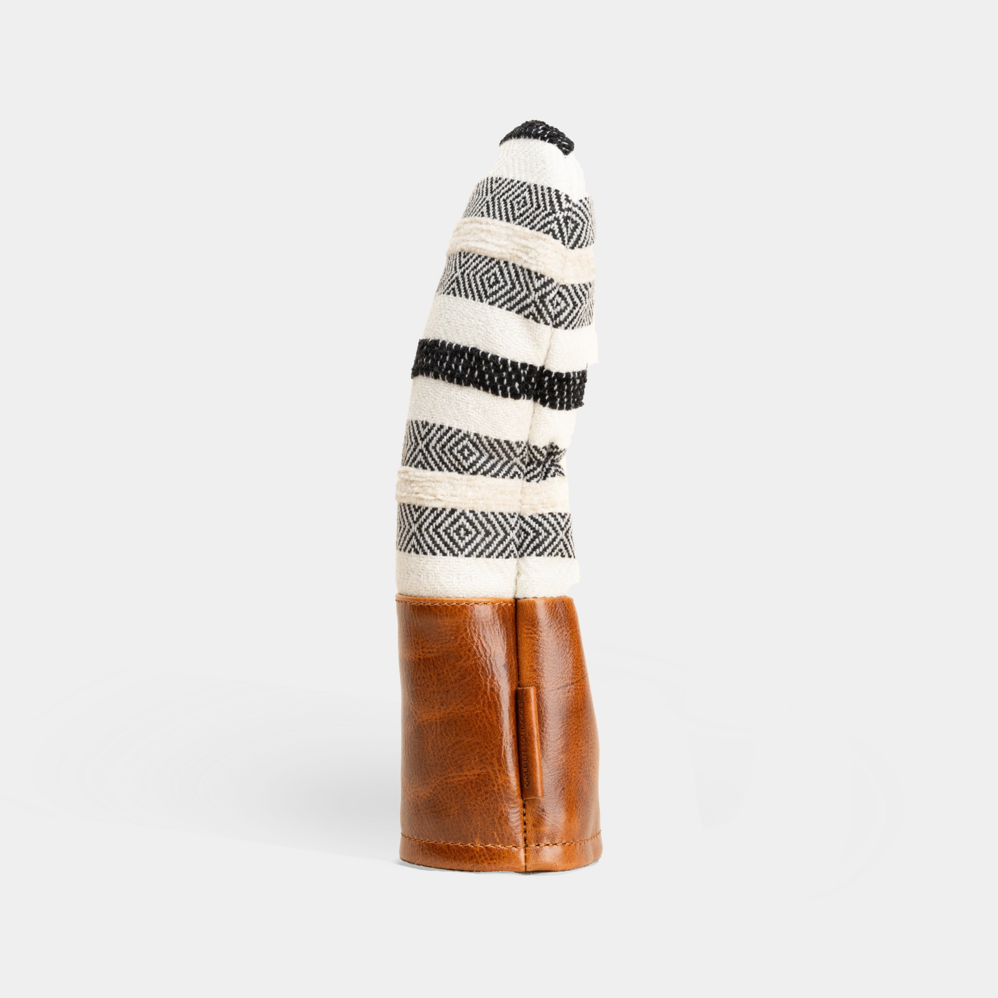 Fairway wood head cover with geometric pattern and brown leather base on a white background