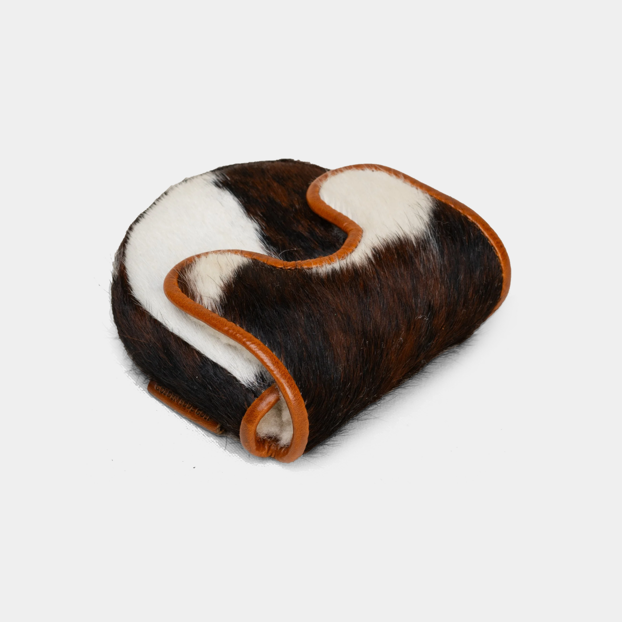 Brown and white handcrafted leather mallet putter cover with cowhide pattern and contrast trim - side view