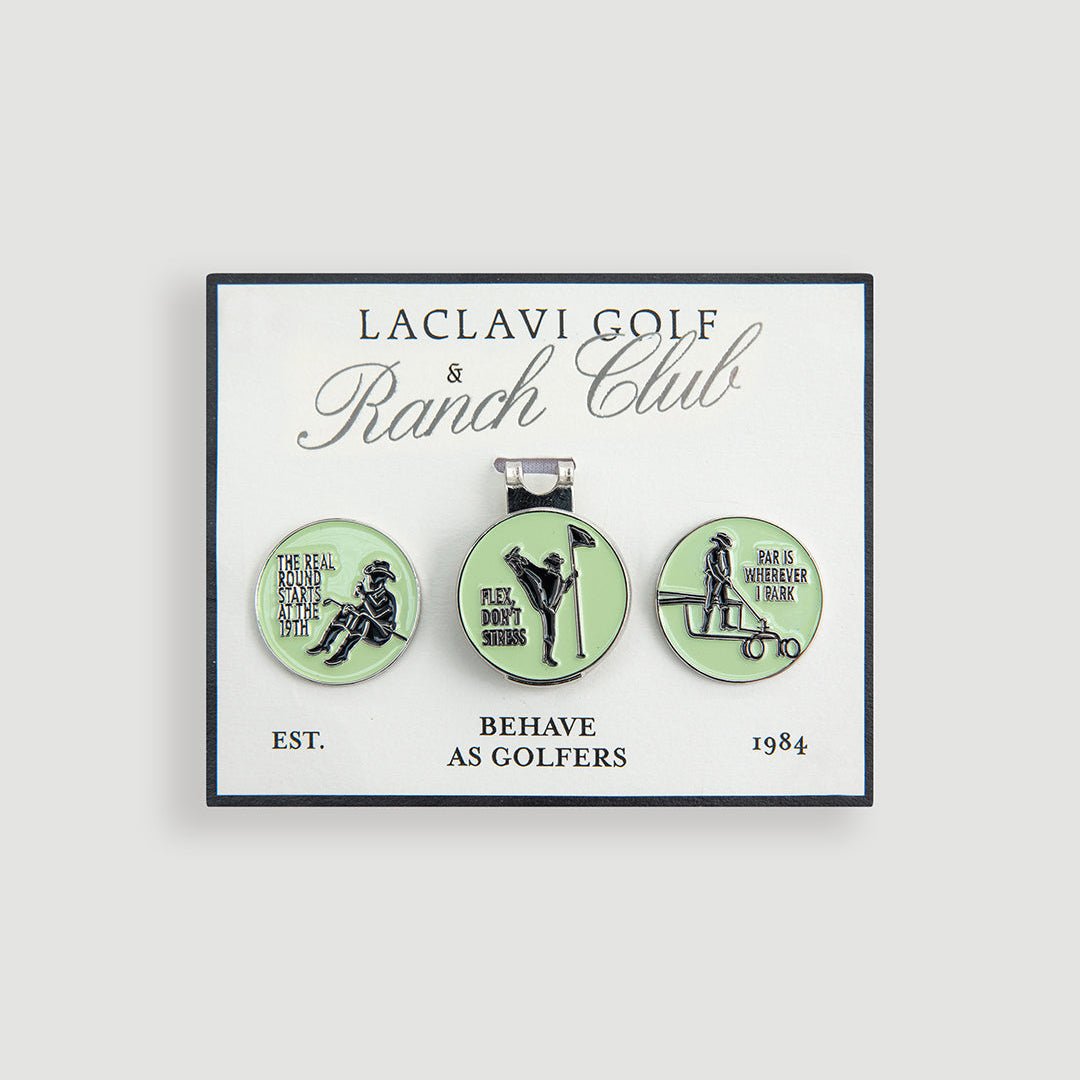 Green enamel golf ball marker set with silver hat clip on Laclavi Golf Ranch Club branded display card - Laclavi Golf
