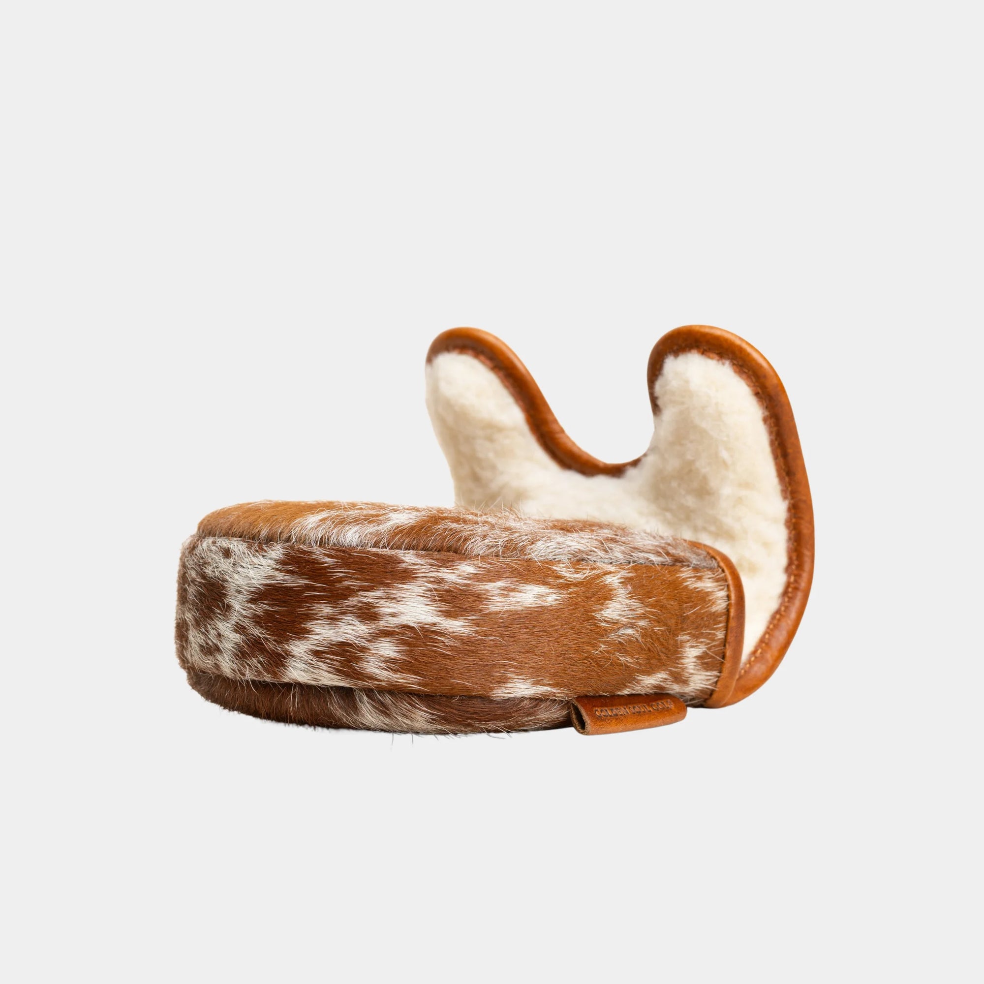 A Lahorna Center DF3 Putter Cover  made of brown and white cowhide with a smooth tan leather trim, shown on a light gray background.