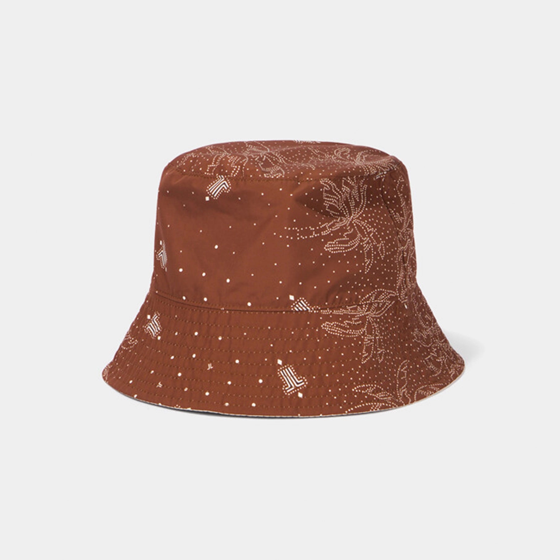 Brown bucket hat with subtle pattern on a light gray background