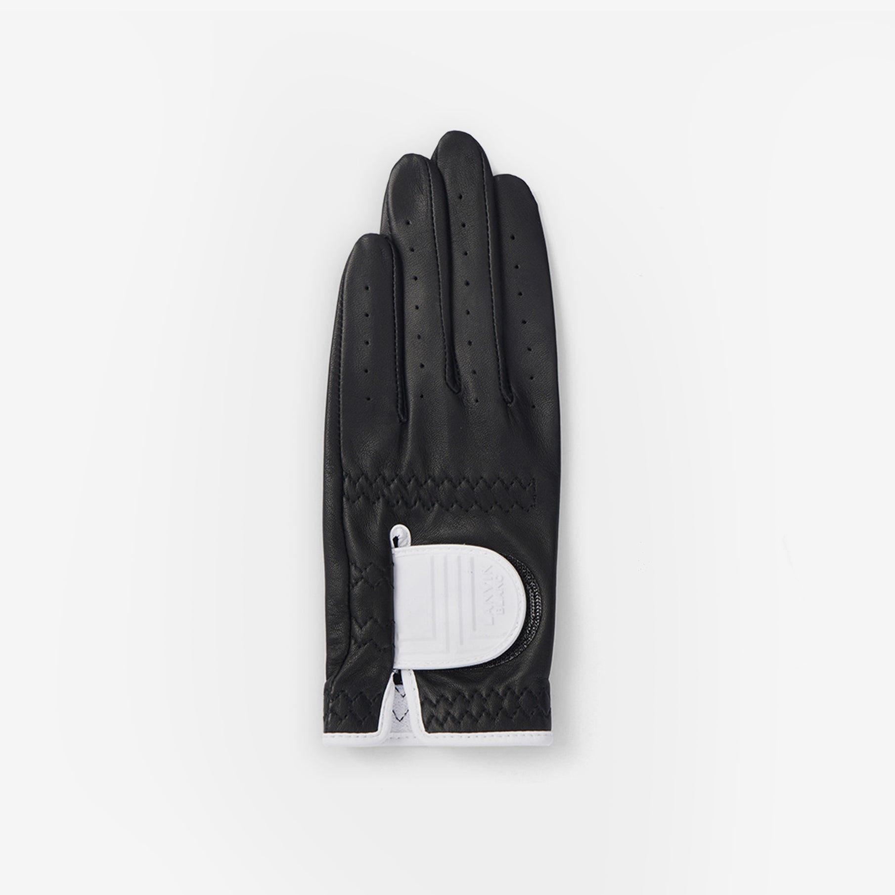 Black glove with a white label on a light gray background