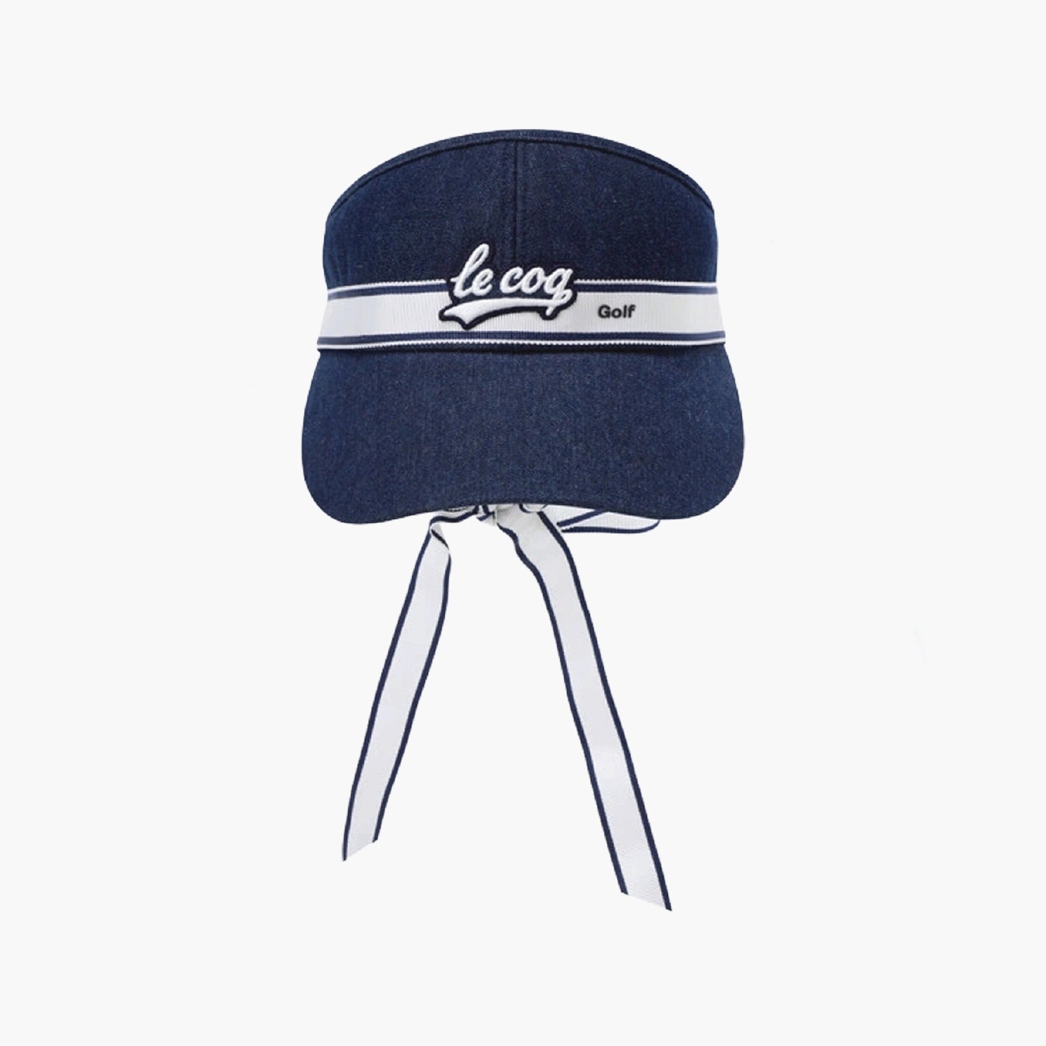 A navy blue denim golf cap with a white band featuring the 'le cog Golf' logo, finished with matching white and navy ties hanging from the brim, shown against a plain white background.