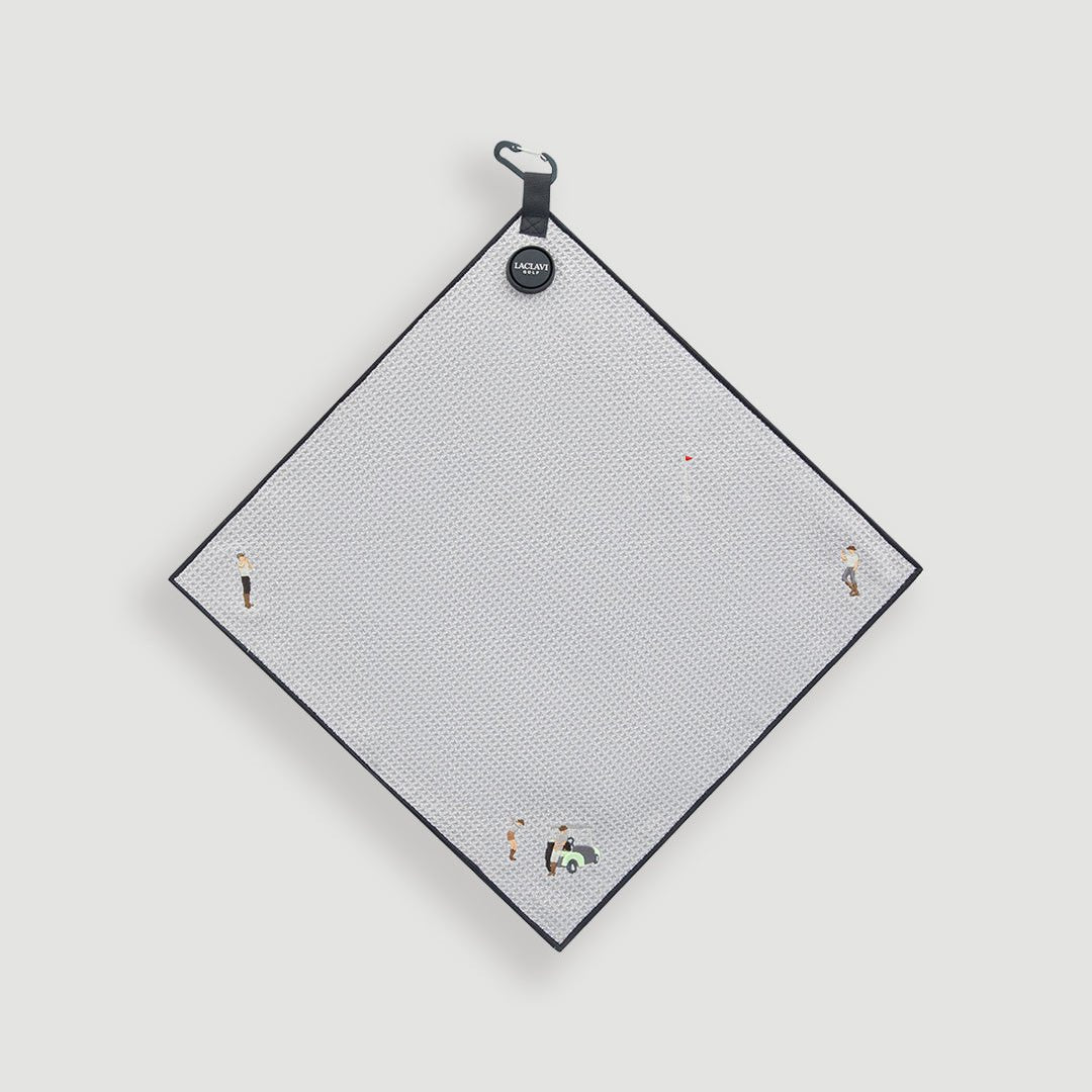 Gray magnetic golf towel with black border displayed diamond shape with magnetic clip and ball markers - Laclavi Golf