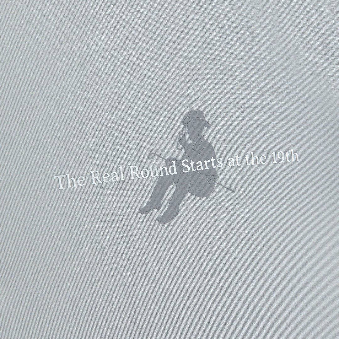 The Real Round Starts at the 19th cowboy golfer brand graphic on gray textured polo fabric - Laclavi Golf