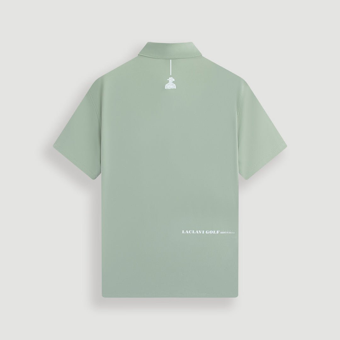 Green men's cowboy performance polo back view with cowboy silhouette embroidery and Laclavi Golf text at hem - Laclavi Golf