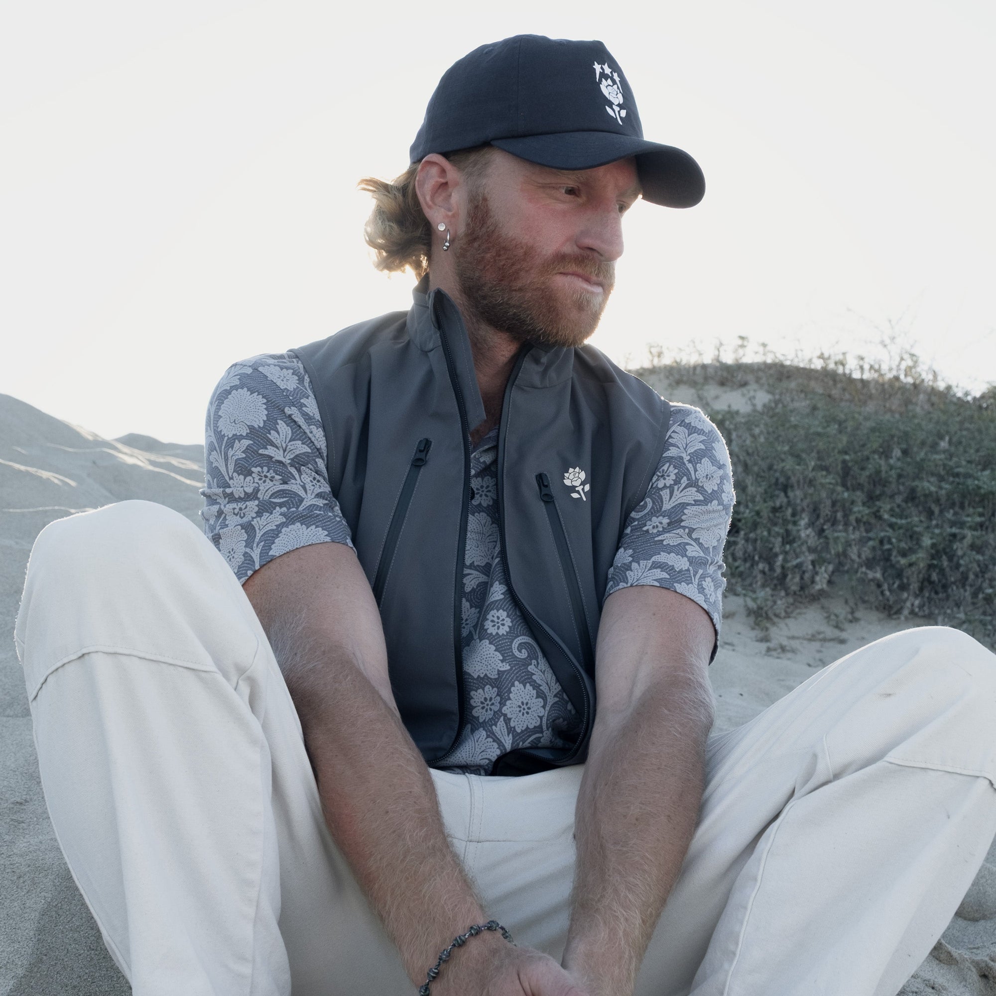 Man wearing Men's Phantom Polo - Paisley Blue - Erthe Golf